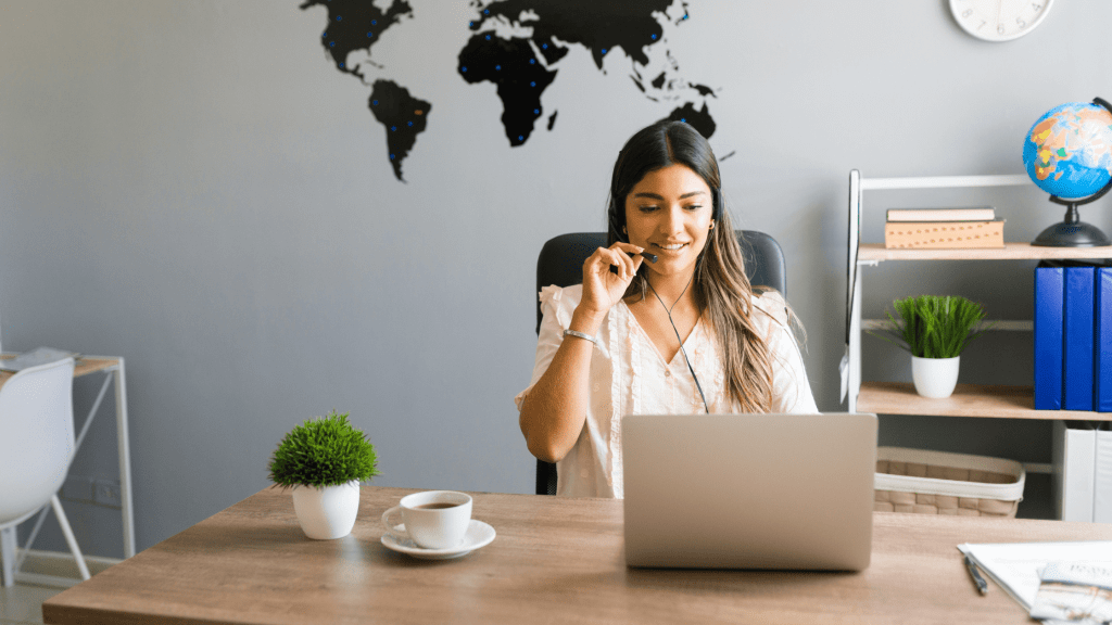 travel agent working on laptop