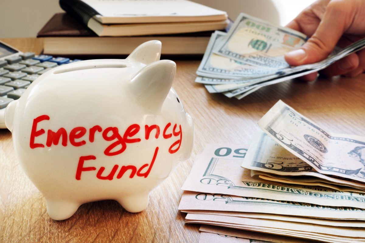 Emergency fund written on a piggy bank. Emergency fund written on a piggy bank.