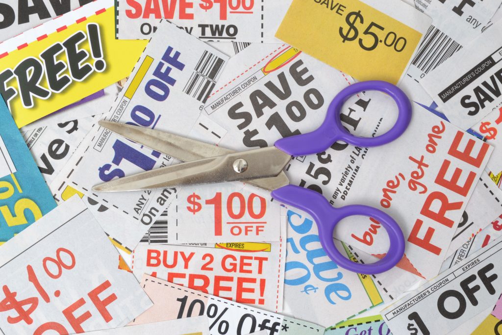 pair of scissors on grocery coupons