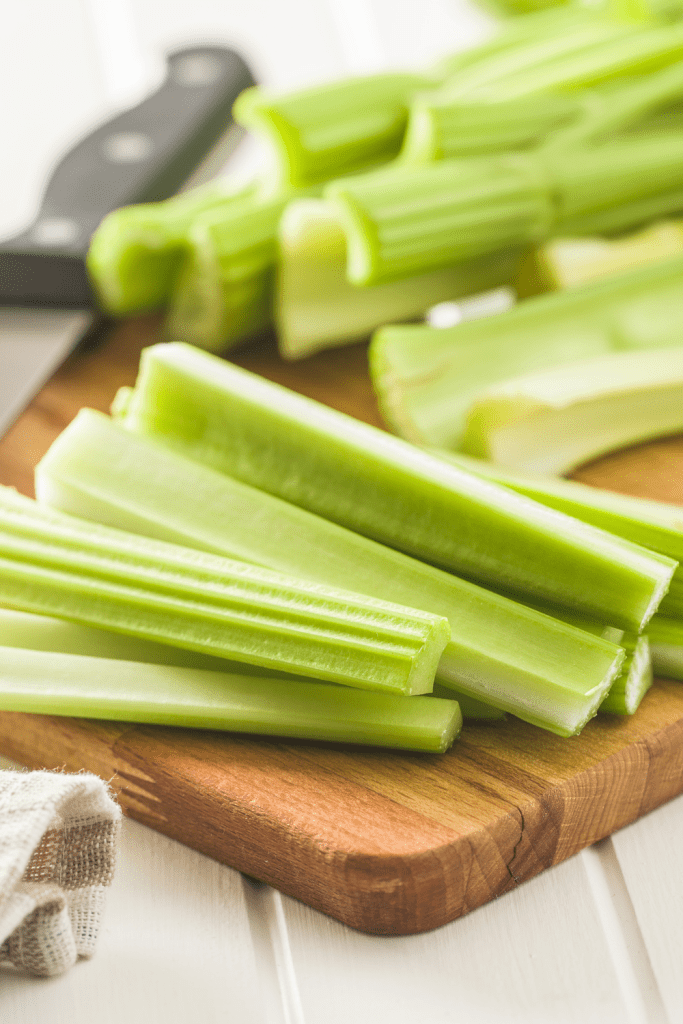 Celery on cutting board