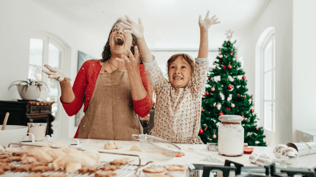 mother daughter baking during holiday season
