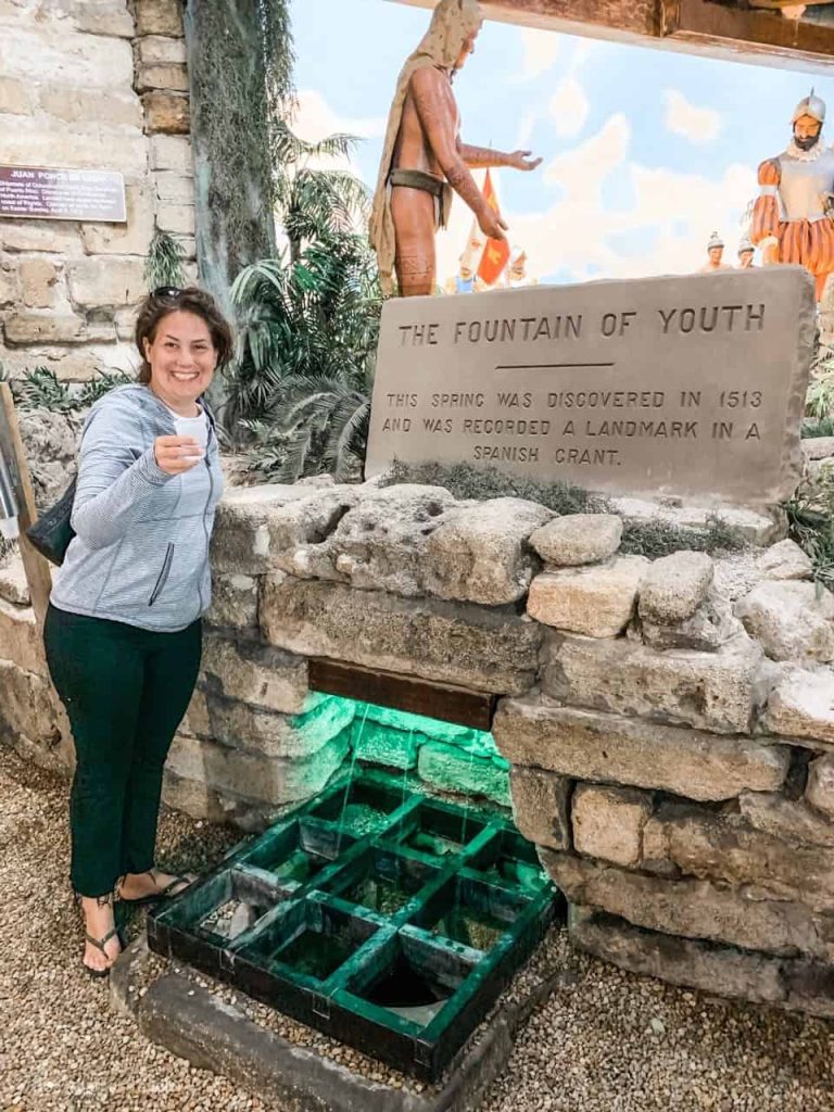 woman drinking from Fountain of Youth St. Augustine