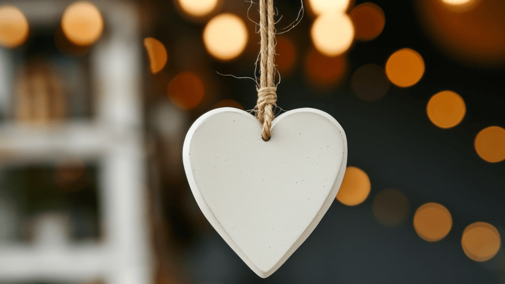 heart shape clay hanging from thread